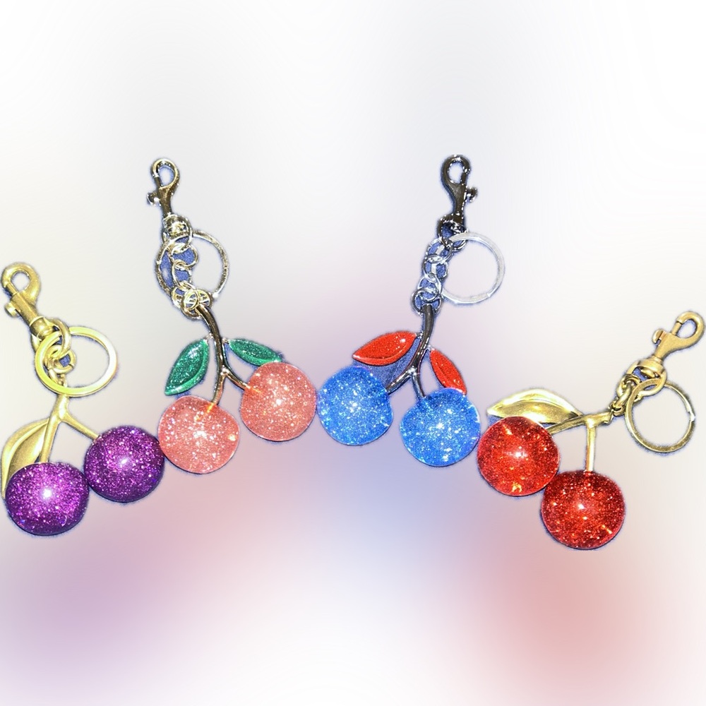 Gift with every bag purchased! Cherry bag charm! 🍒